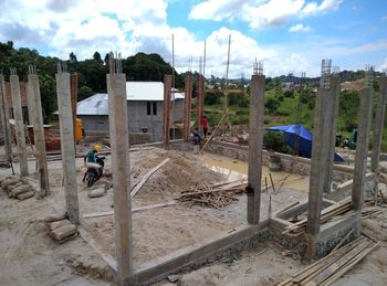 Panoramic shot of construction site against sky