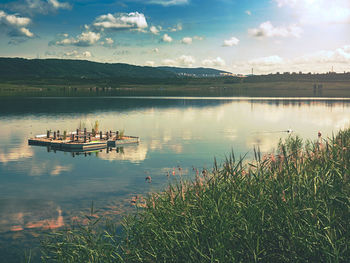 Scenic view of lake against sky