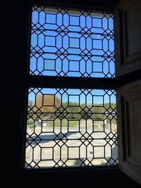 Buildings seen through glass window