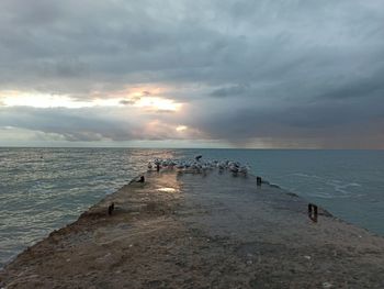 Scenic view of sea against sky during sunset