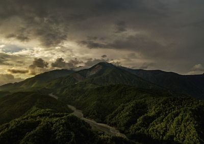 Scenic view of volcanic mountain against sky