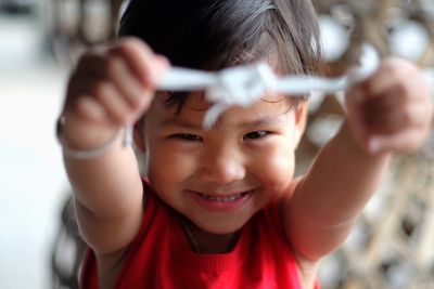 Close-up portrait of a smiling boy