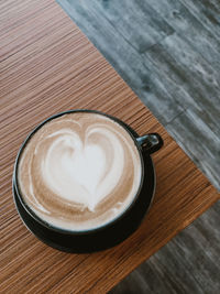 High angle view of cappuccino on table