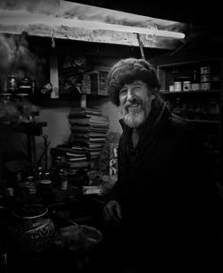 Portrait of smiling man at market