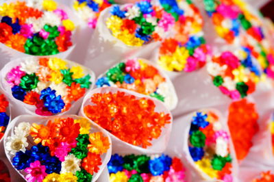 Close-up of multi colored candies on table