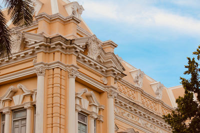 Low angle view of historic building against sky