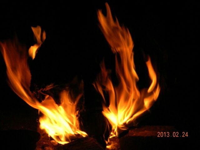 flame, burning, fire - natural phenomenon, heat - temperature, bonfire, firewood, night, fire, glowing, campfire, heat, orange color, motion, close-up, dark, outdoors, light - natural phenomenon, no people, illuminated, long exposure