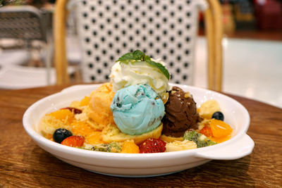 Close-up of ice cream in plate on table