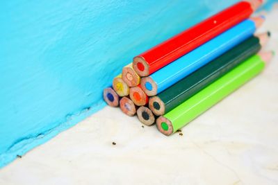 High angle view of multi colored pencils on table