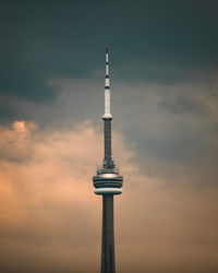 Low angle view of communications tower against sky