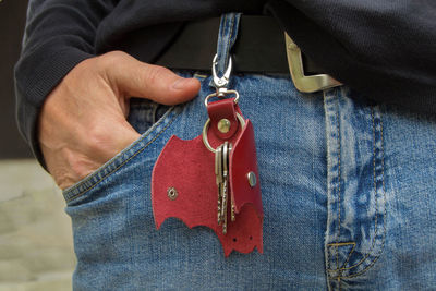 Close-up of man holding hands