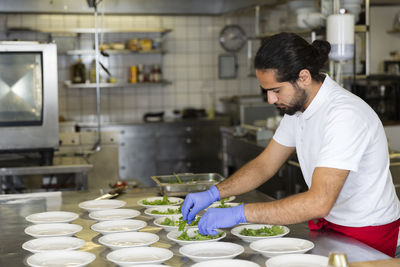 Chef working in kitchen