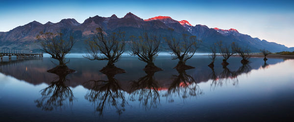 Reflection of mountains in lake against sky