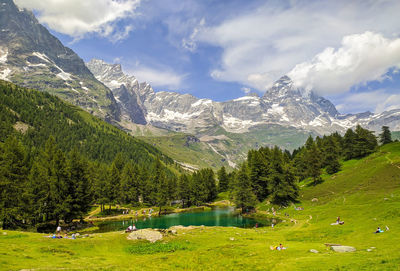Alpine landscape with the matterhorn cervino reflected on the blue lake lago blu, breuil-cervinia