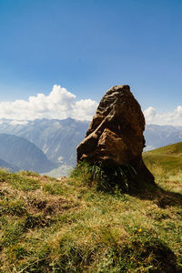 Scenic view of rock against sky