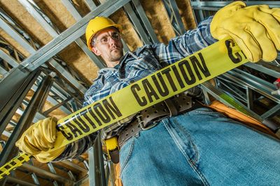 Portrait of man working at construction site