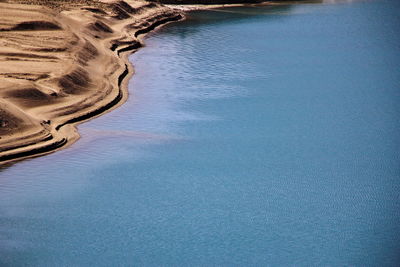 Aerial view of mountain by lake