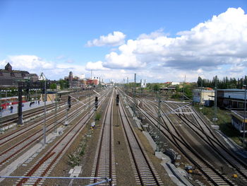 High angle view of railway tracks against cloudy sky