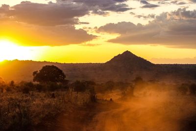 Scenic view of landscape against sky during sunset