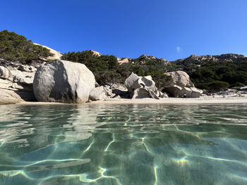 Scenic view of sea against clear blue sky