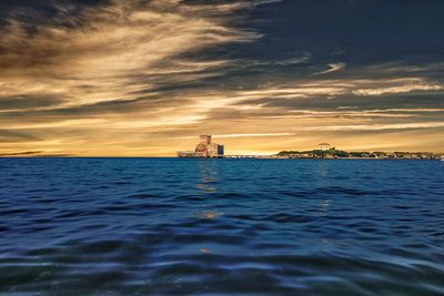 Scenic view of sea against sky during sunset