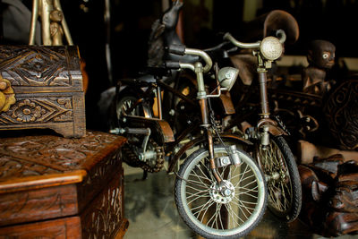 Close-up of trunks and bicycles at market