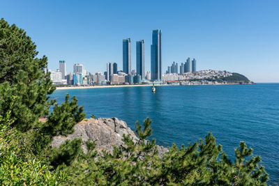 Scenic view of sea against clear blue sky