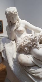 Close-up of white statue in museum