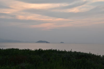 Scenic view of sea against sky during sunset