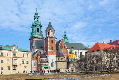 Buildings in city against sky