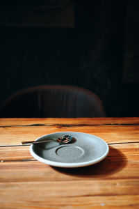 Close-up of coffee cup on table