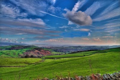 Scenic view of agricultural field against sky at night