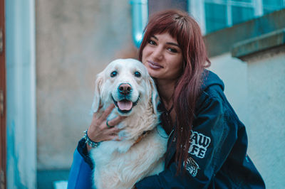 Portrait of woman with dog