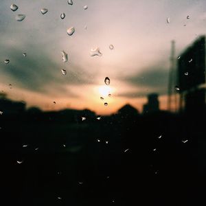 Close-up of water drops on glass