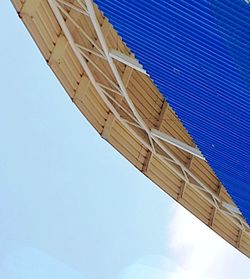 Low angle view of building against clear blue sky