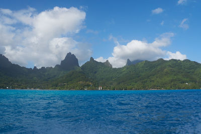 Scenic view of sea against blue sky