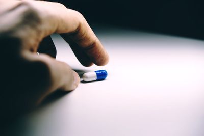 Close-up of person holding hands