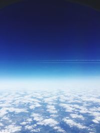 Scenic view of landscape against blue sky