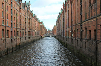 View of buildings in city against sky