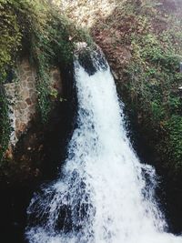 High angle view of waterfall in forest