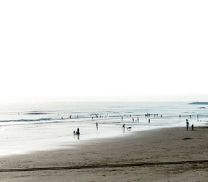 Scenic view of beach against clear sky