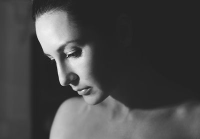 Close-up of thoughtful mid adult woman