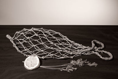 Close-up of rope on table