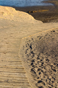 Empty boardwalk at beach