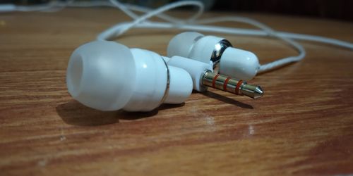 Close-up of electric lamp on table