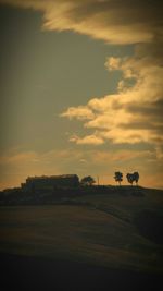 View of clouds over landscape