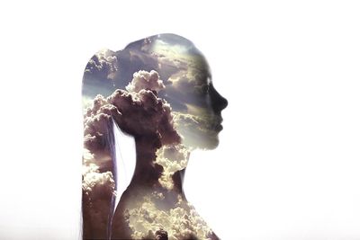 Digital composite of woman and cloudy sky against white background