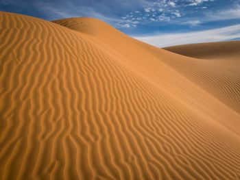 Scenic view of desert against sky