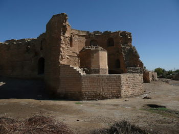 Old ruins of fort against clear sky