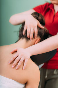 Chair massage. therapist massaging womans neck, stress and tension relief